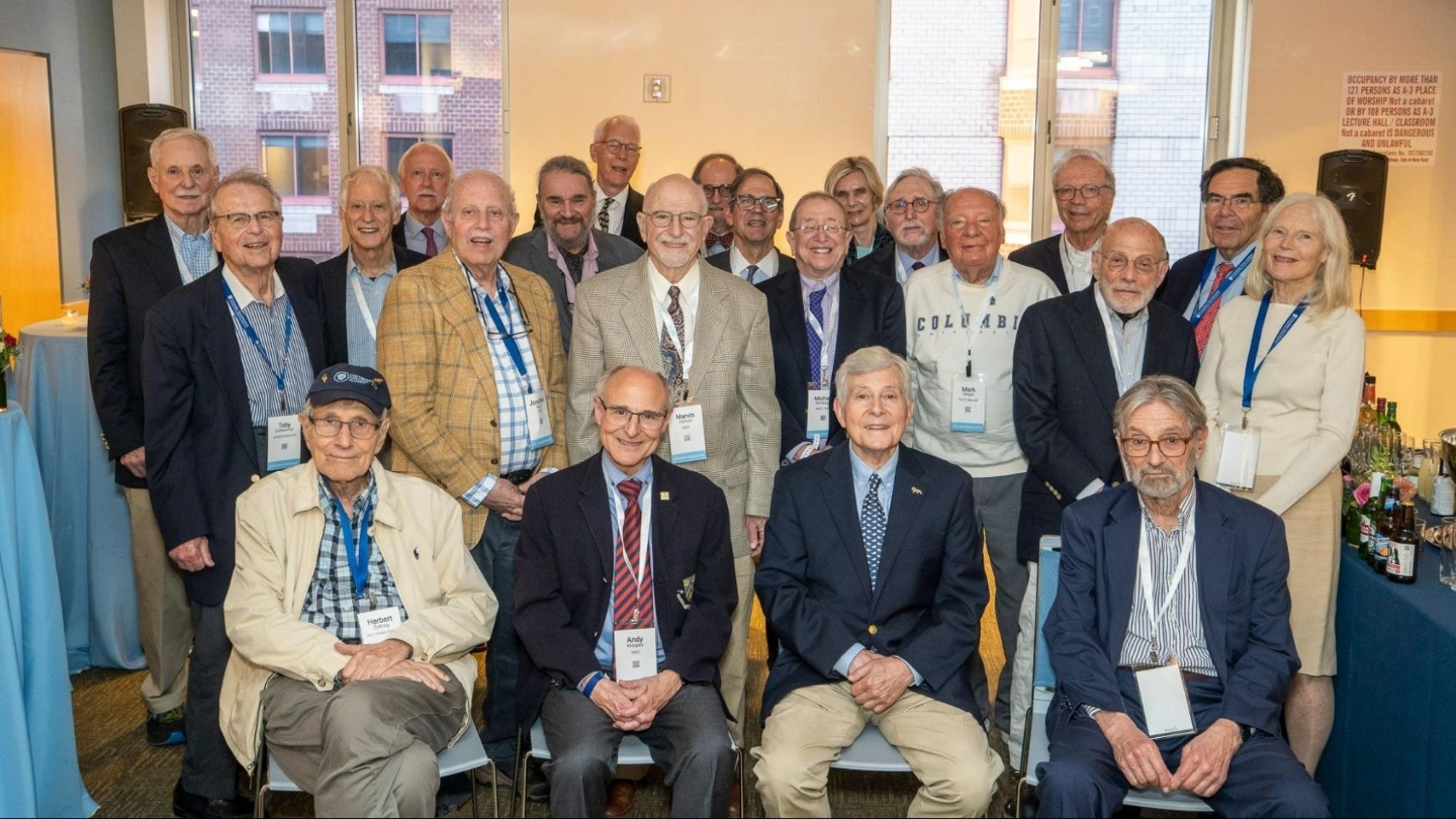 22 Columbia Engineering class of 1975 alums posing for a photo